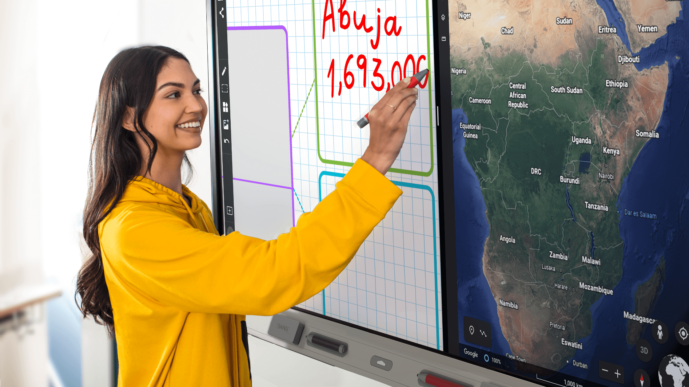 Teacher using split screen on a SMART Board 6000S.