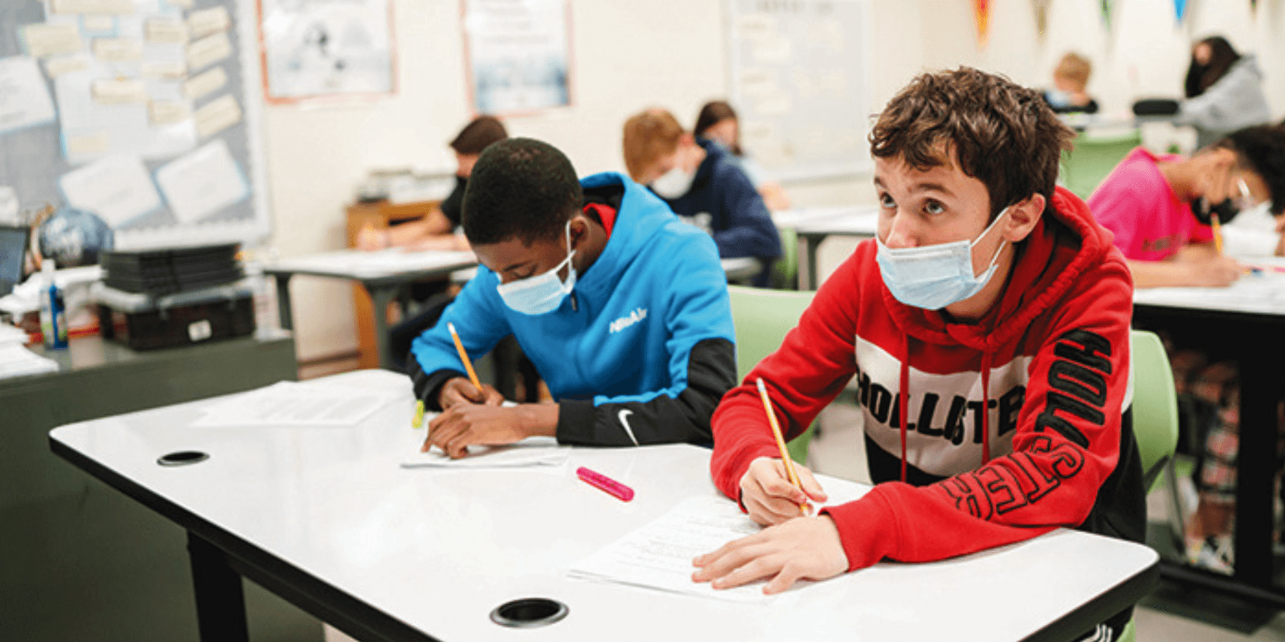 Two Parcells students working and engaging in a lesson. 