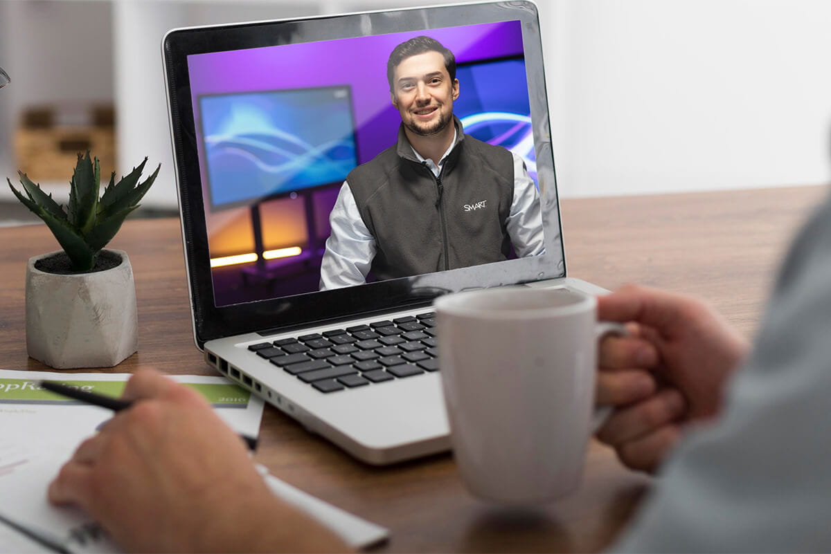 Business professional giving a thorough product demonstration for the latest SMART technology.