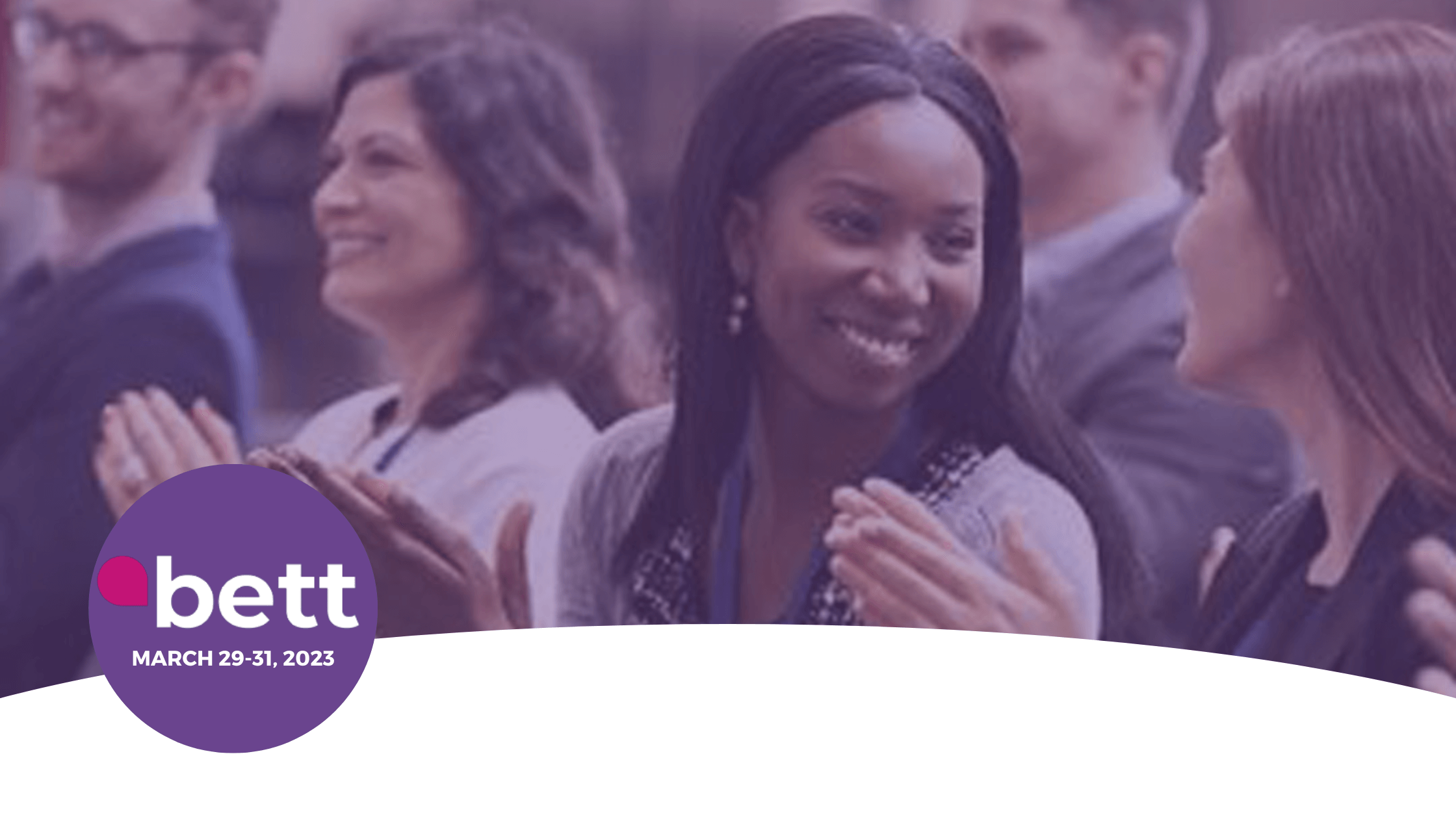 Educators applauding while taking part in Bett.