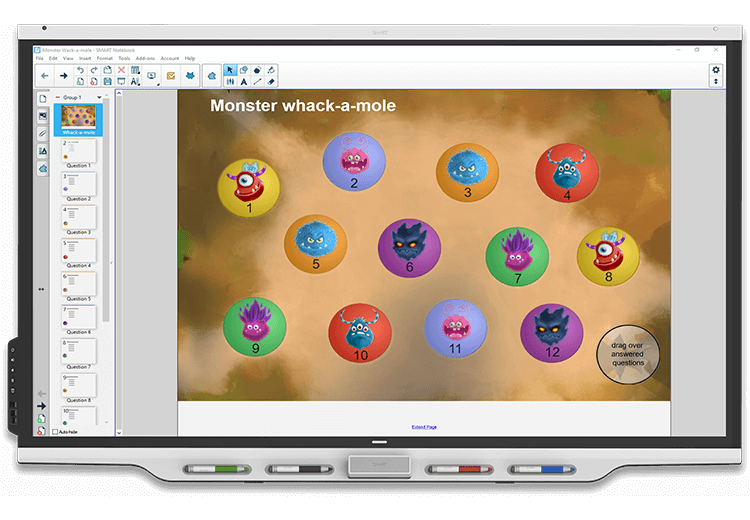 A SMART Board displaying an interactive 'Monster Whack-a-Mole' game.