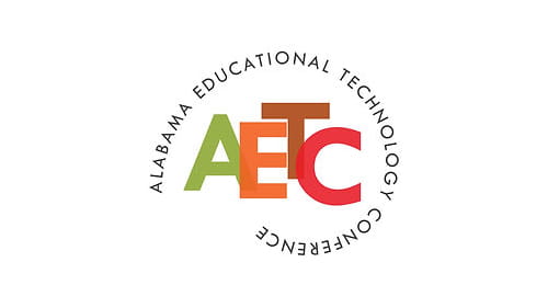 AETC conference logo showcasing vibrant text in green, orange, and red.