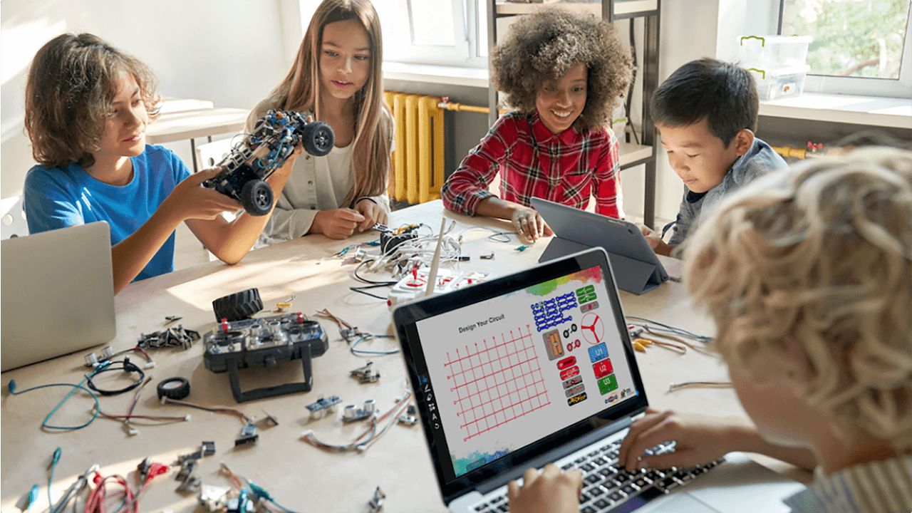 A group of students working together on a robotics project with a laptop displaying a circuit design tool.