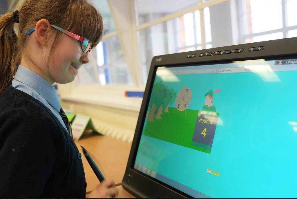 A student engages with a Lumio lesson on her tablet at a SMART Exemplary School.