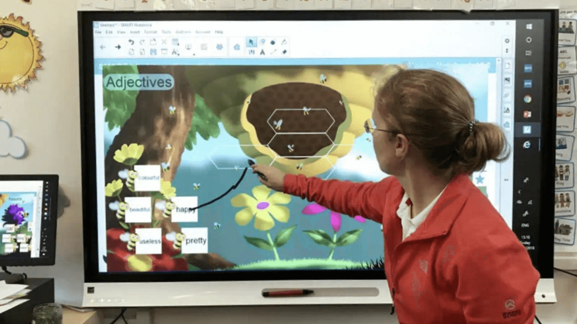 An educator using Lumio on a SMART Board.