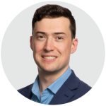 Headshot of Connor Blake, dressed in business attire.