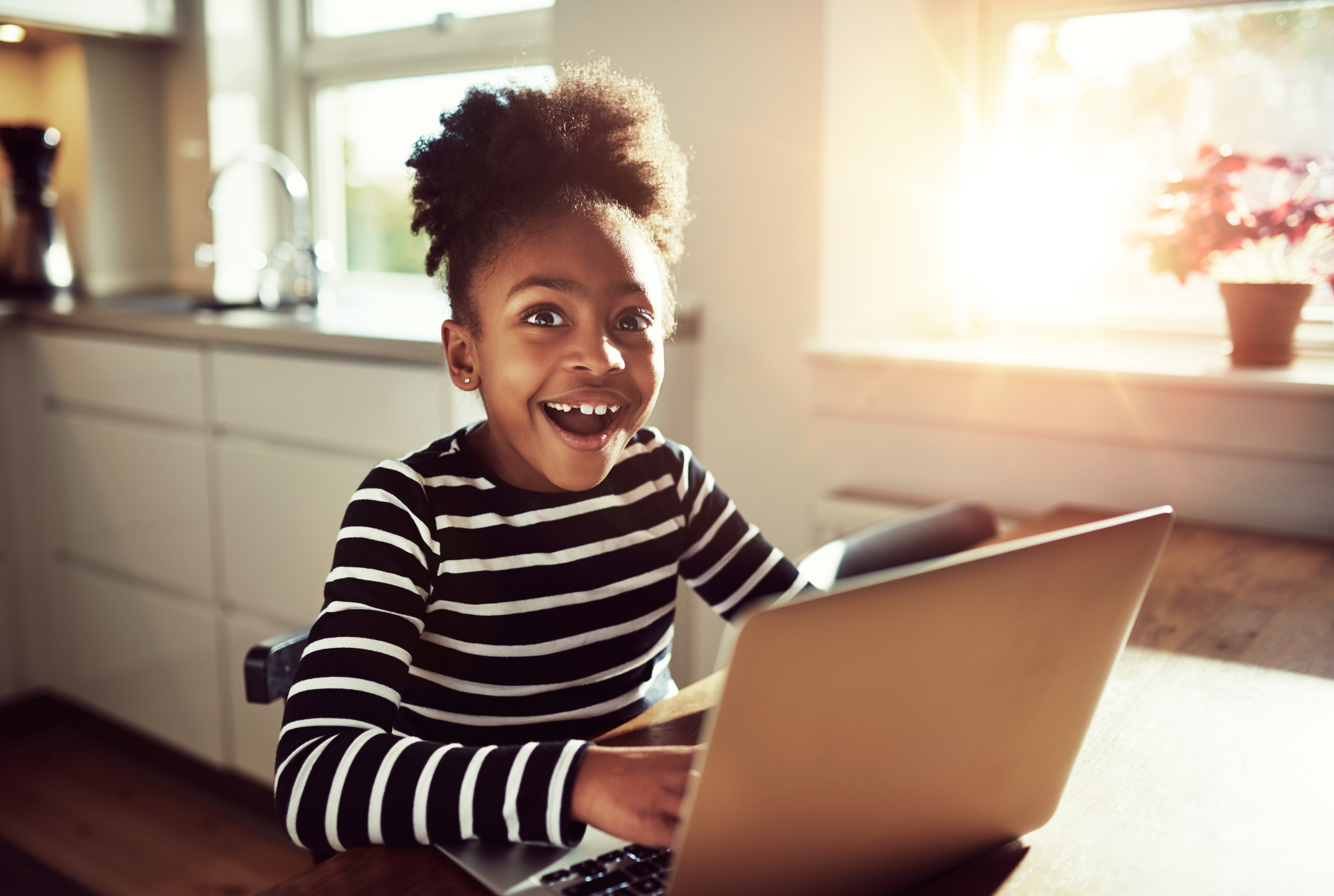 A young student excited to participate in coding in Lumio.